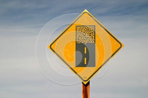 Paved Road Ends Ahead Sign