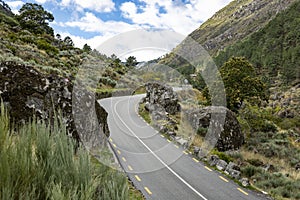 Paved road through the glacier valley next to Manteigas photo