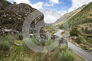 Paved road through the glacier valley next to Manteigas photo