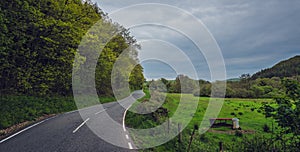 Paved road through the rural countryside in central Wales