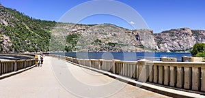 Paved road on top of O`Shaughnessy Dam; Hetch Hetchy Reservoir visible on the right; Yosemite National Park; Hetch Hetchy Valley