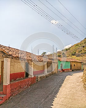 A paved street with houses in Pipincatla H Ayuntamiento de Ixcateopan de Cuauhtemoc, a small pueblo in the mountains of Guerrero.