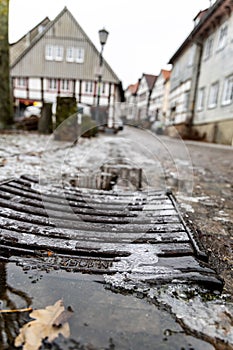 Pavement covered with ice on the street of an ancient European town