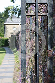 A pavement and the gate in Glasgow's Pollok Country Park photo