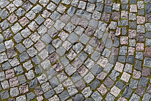 Pavement of granite stone.Old cobblestone road pavement texture,