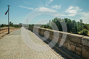 Pavement made of setts on top of Roman bridge int Merida