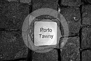 Pavement with metal sign street of Porto, Portugal