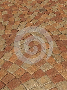 Pavement pattern made with cast concrete blocks.