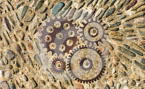 Pavement texture with gears and bricks in Montjuic, Barcelona, Spain