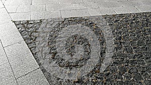 Pavement tiles - combined dark gray and light gray stone tiles