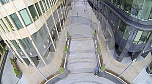 Pavement between two office buildings. View from photo