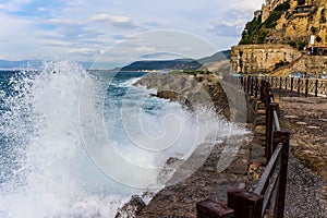 Paveway along the meditteranean sea with breaking waves