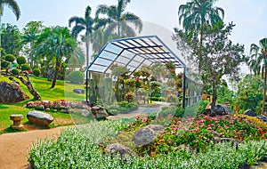 Pavilion with ampelous flowers, Mae Fah Luang garden, Doi Tung, Thailand photo