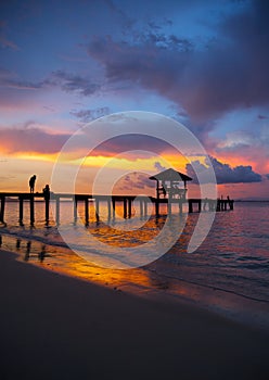 Pavilion on the beach with sunset