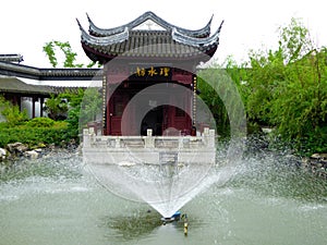 A pavilion with a fountain