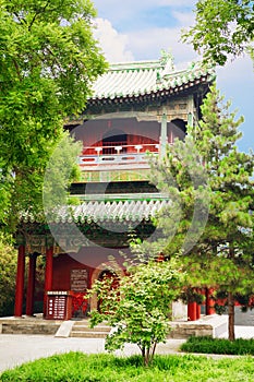 Pavilion in Garden of Peace and Harmony. The sign near the pavilion says `you can hang a lock here for good luck.` Beijing, China