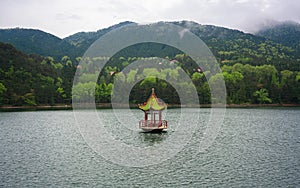 Pavilion in middle of Lulin lake in Lushan national park Jiangxi China