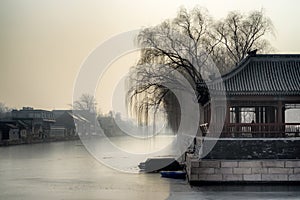 Pavilion by the moat, water became frozen at the Forbidden City in winter, Beijing, China