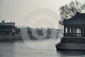 Pavilion by the moat, water became frozen at the Forbidden City in winter, Beijing, China