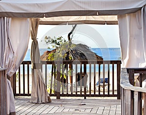 Pavilion in natural style on a beach