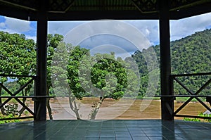 Pavilion beside the river with sylvan trees