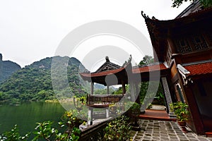 A pavilion in Trang An in Vietnam, famous for its limestone karst peaks