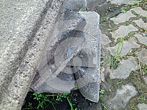 Paving bricks piled up on the side of the road
