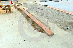 Paving of a new town square built with different materials. photo