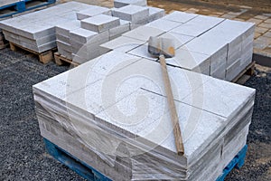 Paving slabs of the pavement, road surface, new street outdoor granite tiles on the sidewalk, repair and