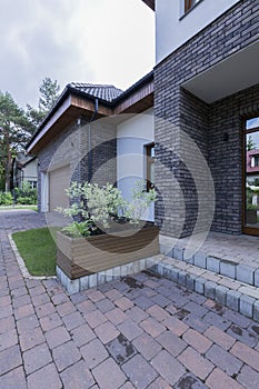 Paving stone doorway to modern house