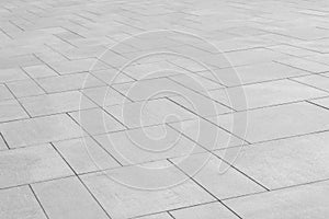 Paving stones background. Road texture black and white. Stone flooring. Stone covering on the square.