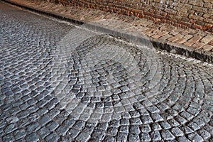 Paving stones - a hard road surface, a kind of pavement, lined with flat rectangular bars of the same shape and size