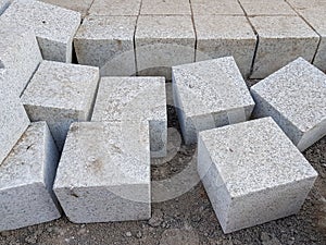 Paving stones from large granite cubes.