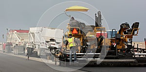 Paving with trucks