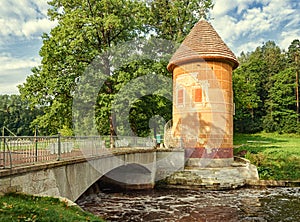 Pavlovsk park. The Pil-tower by the Slavyanka river.