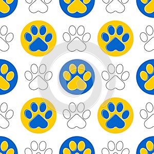 Paw of a cat or dog. Blue and yellow animal paws on a white background. Cute seamless pattern.