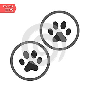 Paw logo of cat or dog animal pet. Vector paw footprint in circle icon - Vector