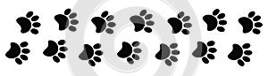 Paw prints animal track footpath stripe banner divider border design element.