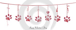 Paw prints with hanging red hearts