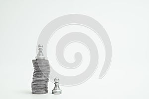 Pawn stand higher on pile of coin. Business competitive and advantage on capital