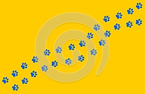 Paws of a cat, dog, puppy in blue color on a yellow background in a flat design.