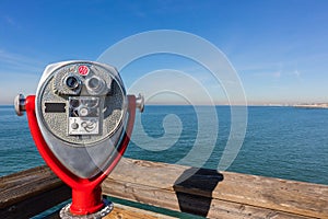 Pay binoculars overlooking the ocean