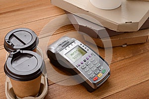 Pay for coffee and pizza by card or phone