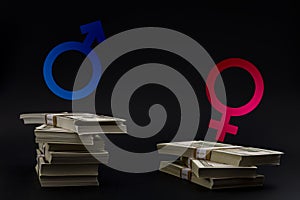 The pay gap and discrimination conceptual idea with the Mars symbol for men and Venus symbol for women on top of unequal stacks of