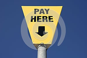 Pay here sign