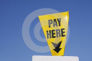 Pay Here sign