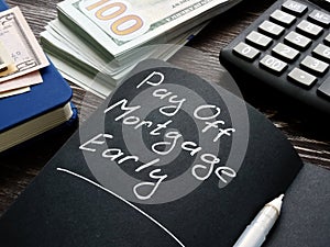 Pay off mortgage early memo on the page. photo