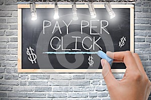 Pay per click, online marketing strategy, handwriting on blackboard