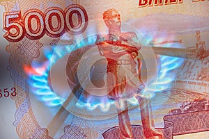 Pay for Russian gas in roubles concept. Russia Sanctions and Ukraine war concept. Blue gas burning from a kitchen gas stove with