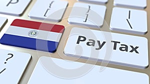 PAY TAX text and flag of Paraguay on the buttons on the computer keyboard. Taxation related conceptual 3D rendering